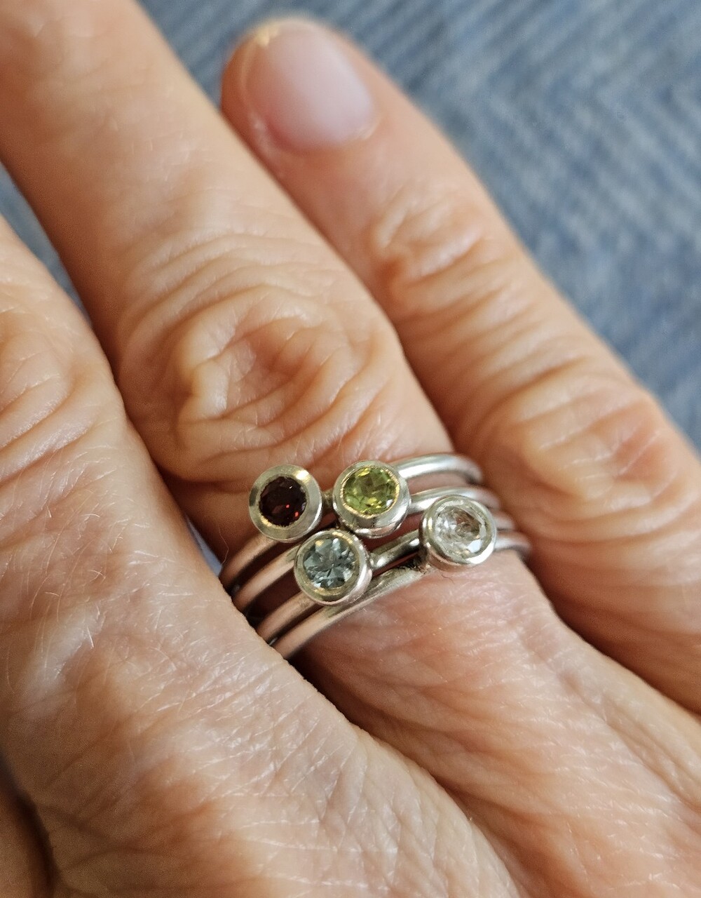 Set Of Four Silpada Silver Stack Rings With Green, Blue, Clear & Garnet Stones